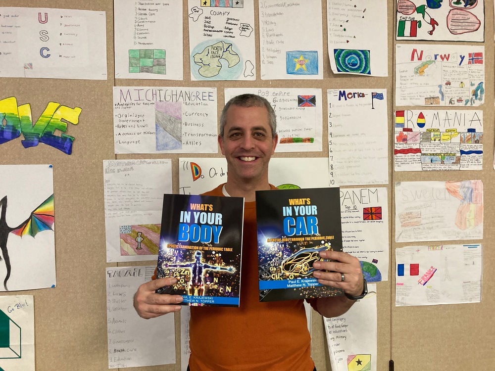 Teacher holding books