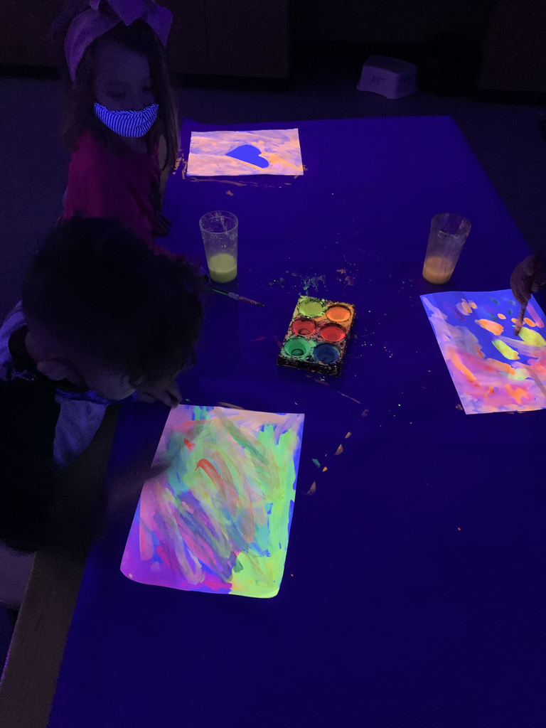 Kindergarten got to explore color mixing with fluorescent paint this week in art class under the black lights purchased by our amazing PTA. 