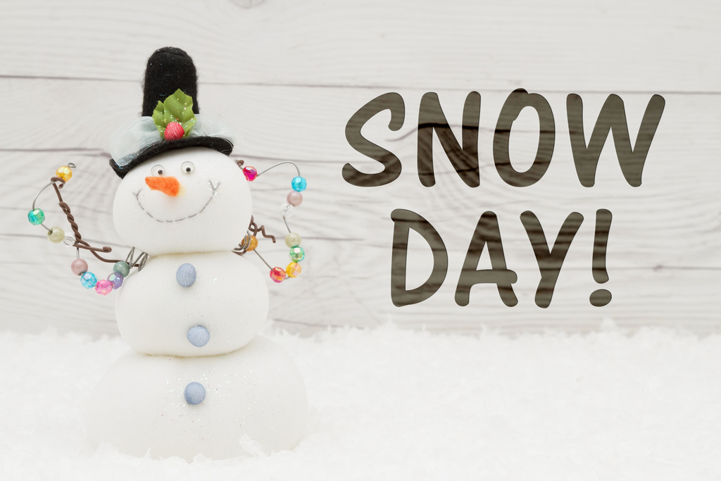 snow man says "snow day!" 