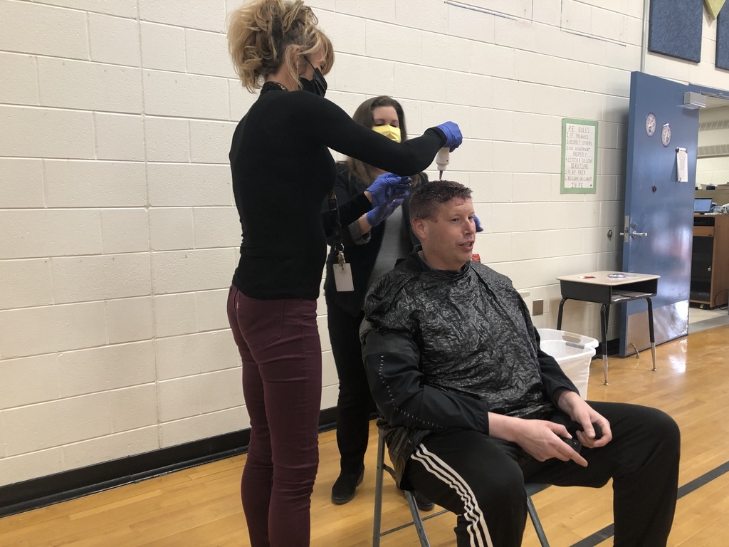 teachers dyeing another teacher's hair