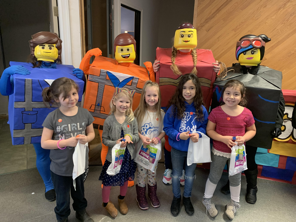 1st grade students with Lego characters
