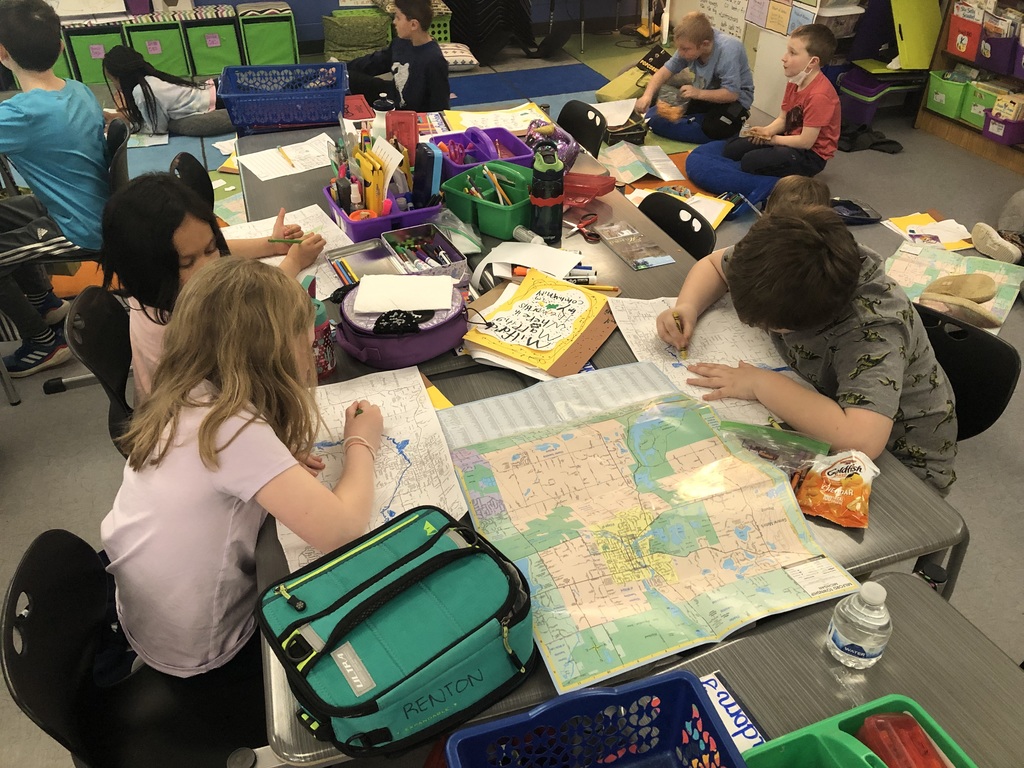 students working with maps