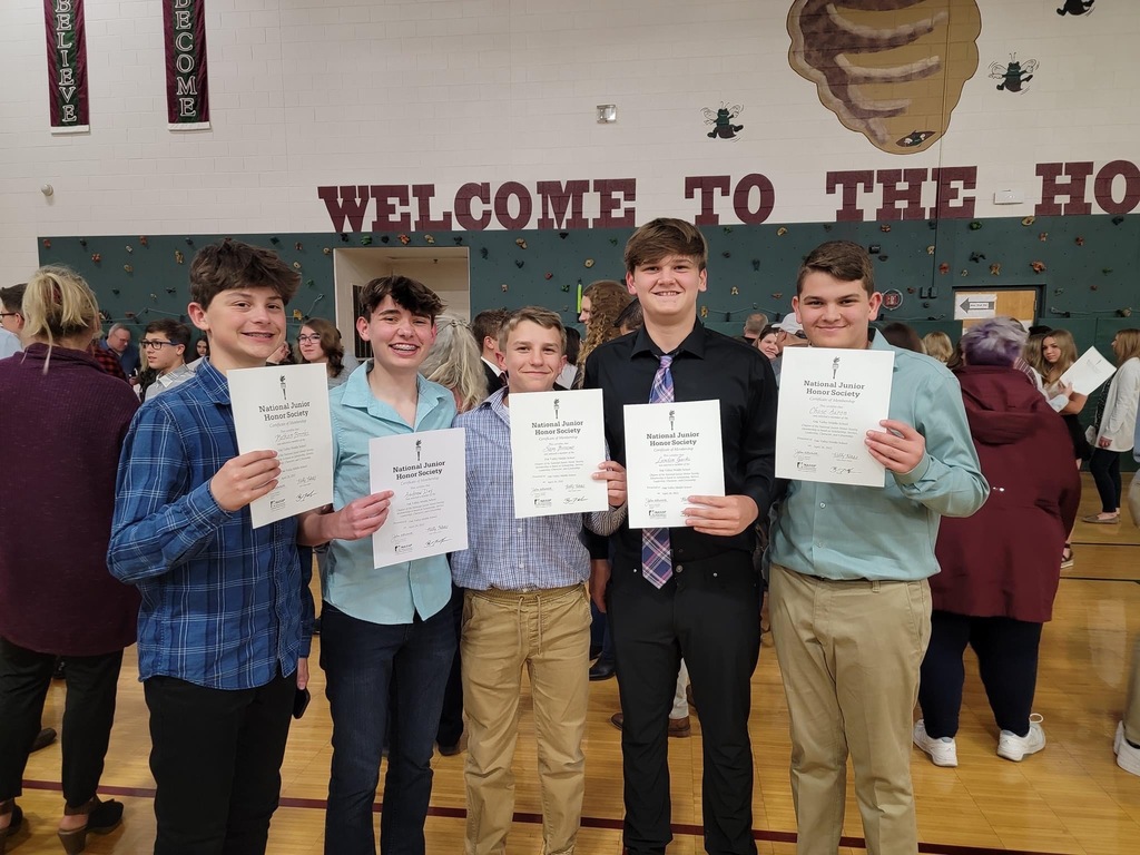 Boys holding NJHS certificates