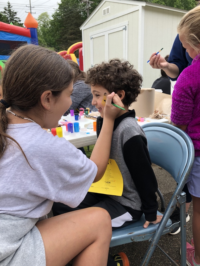 kids getting their faces painted