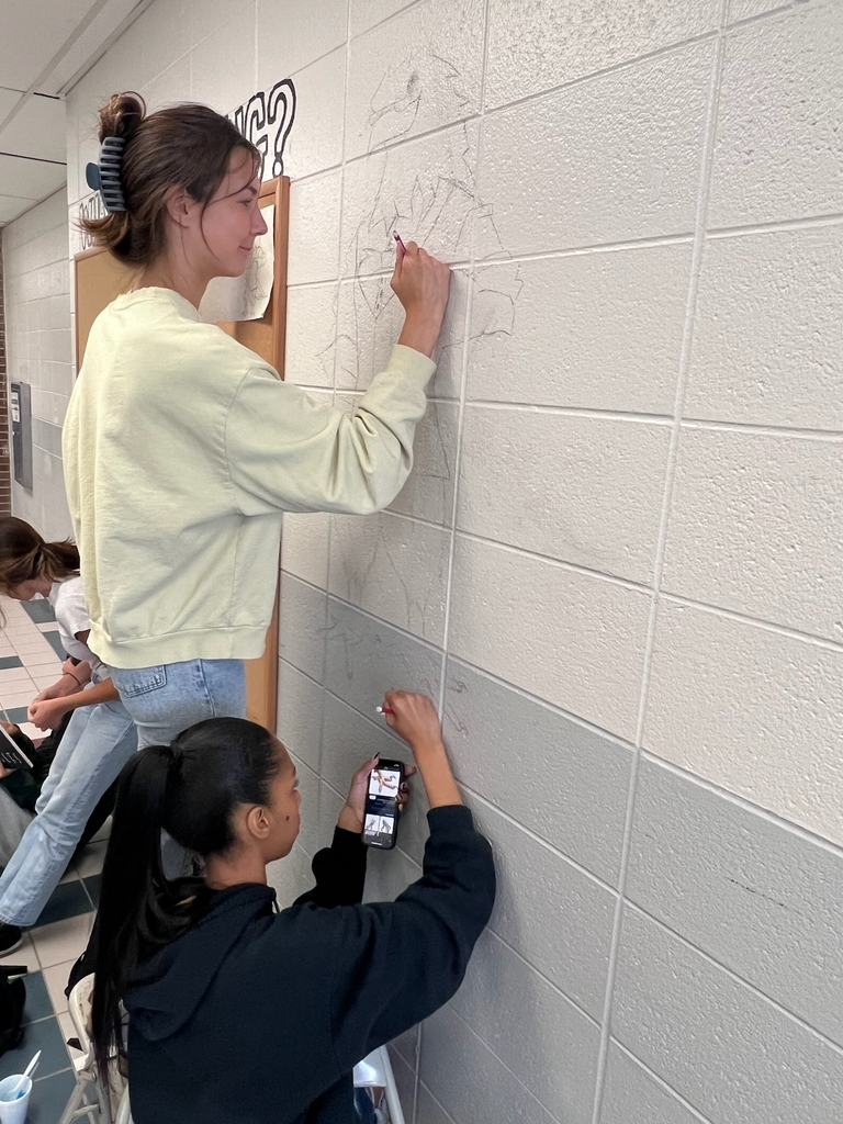 Art Honor Society painting a new mural 