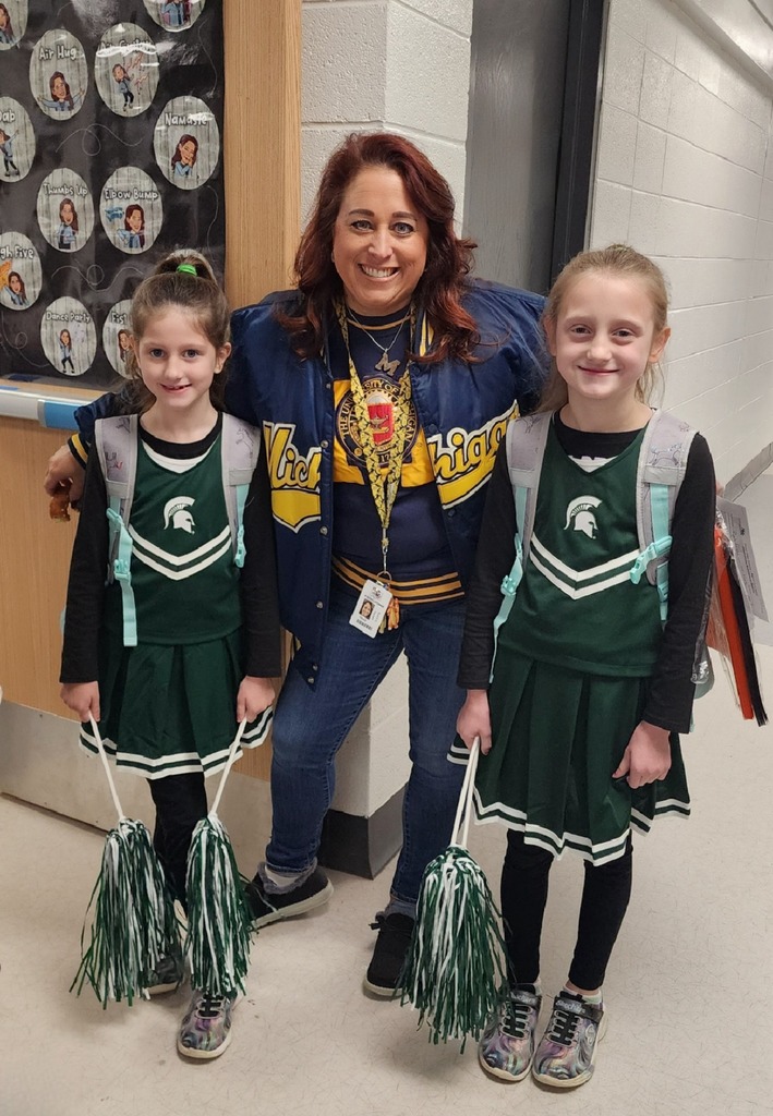 Mrs. Latimer with two students