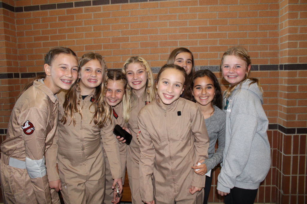 girls in Ghostbuster uniforms