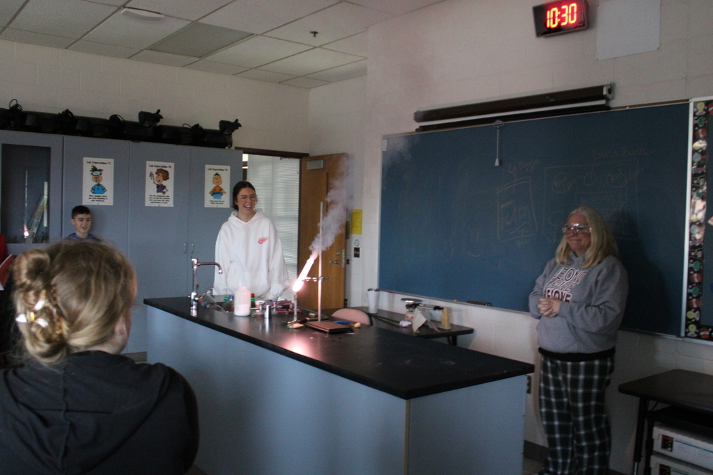chemical reaction demonstration in science lab