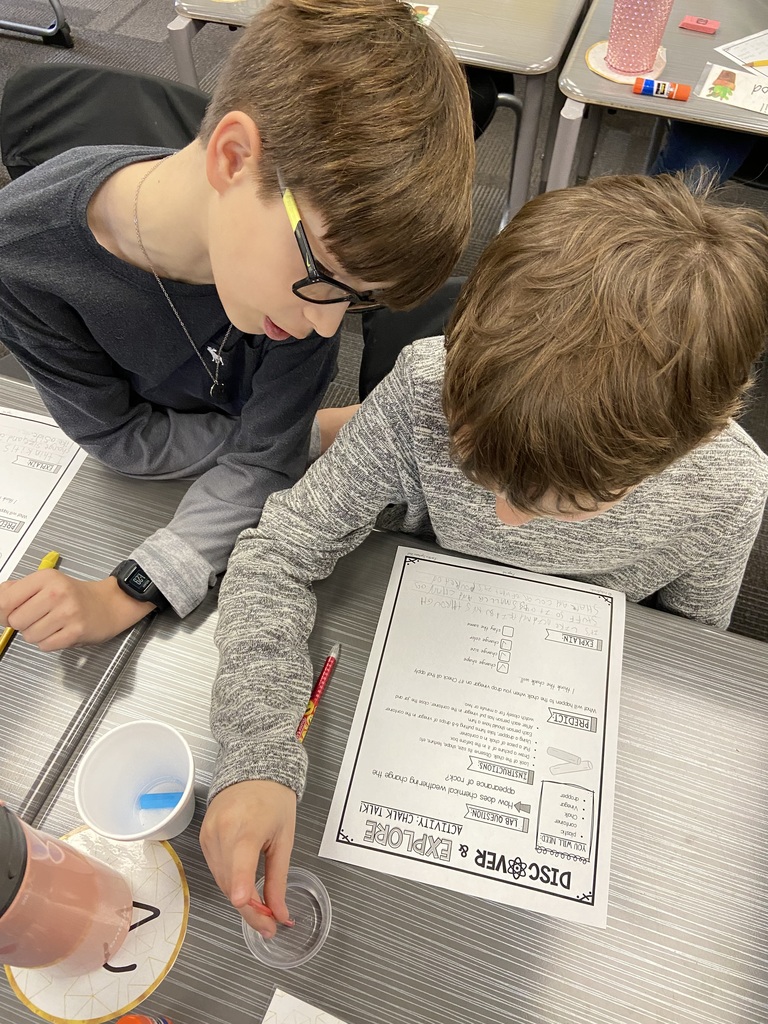 Students completing an experiment