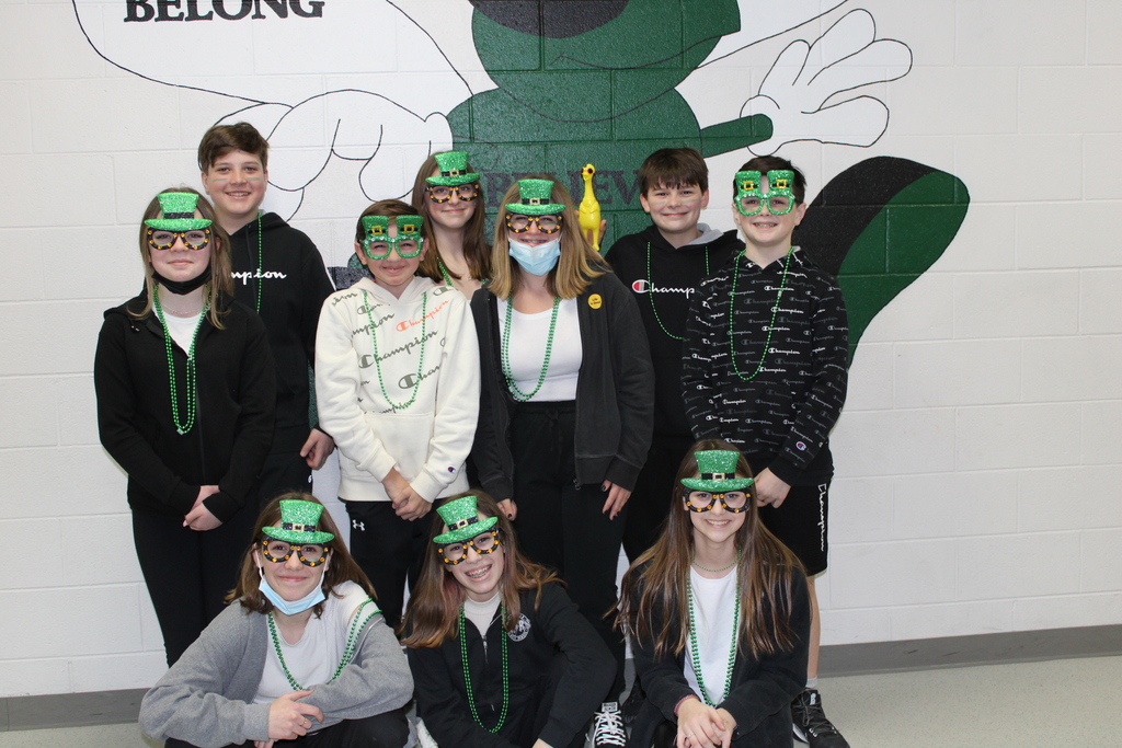 students with leprechaun masks